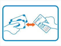 A PaysafeCard being bought with cash