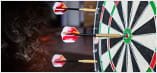 A dartboard with three darts dotted around