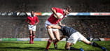 3 rugby players in action during a match
