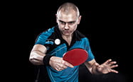 A table tennis player in-game