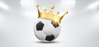 A football ball with a crown on it.