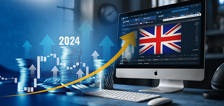 A picture of a computer monitor with a British flag shown. There is also a graph representing the increase in value of the UK gambling market.
