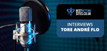 Close-up of a professional podcast microphone with a pop filter, set against a soundproof studio background. A speech bubble reads “Interviews – Tore André Flo” with the BestBettingSites.co.uk logo.